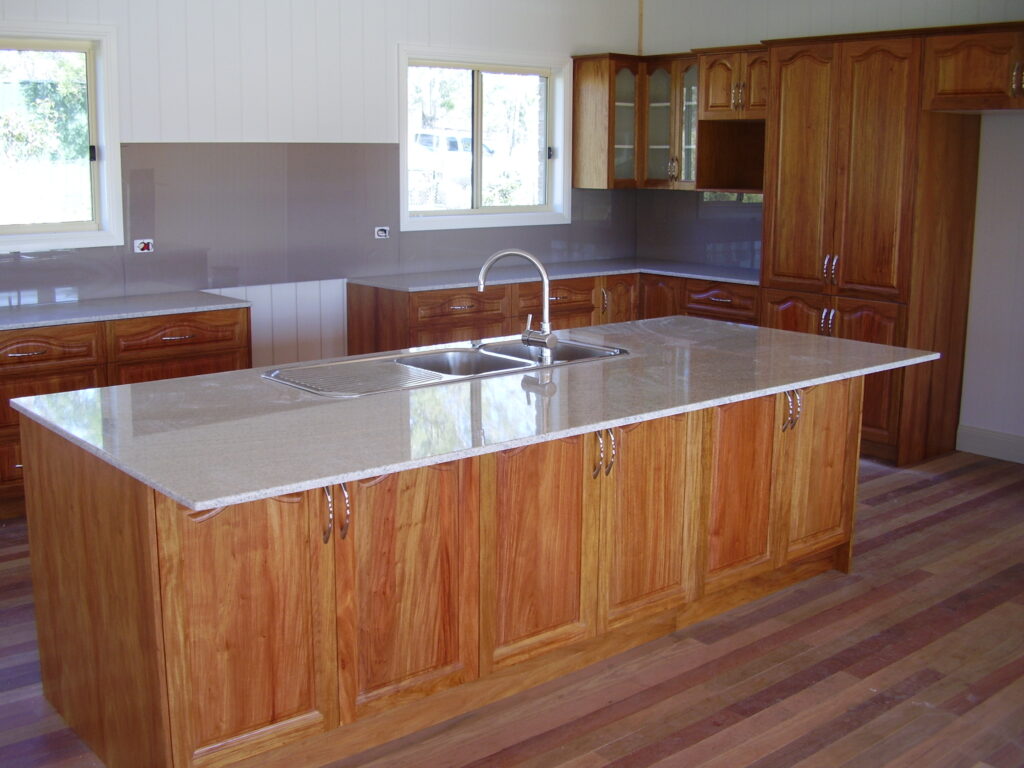 Thin cupboards under breakfast-bar.